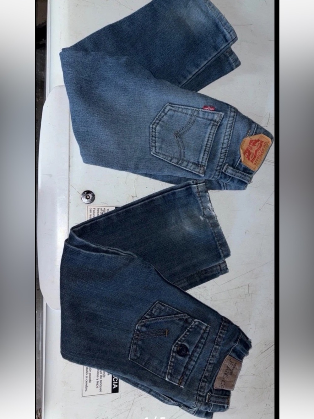 Two pairs of Jeans size 4T - wrangler and Levi